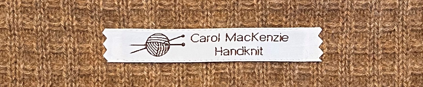 Vintage custom woven label on khaki background.