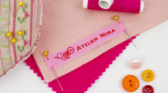 Woven fabric sewing labels for handmade items and small businesses. Personalized Clothing Labels.